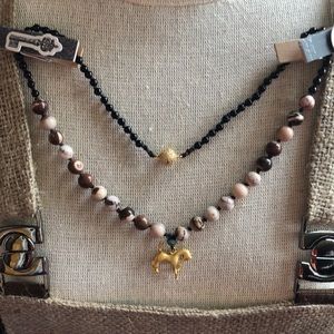 Gold Pony pendant on zebra beads